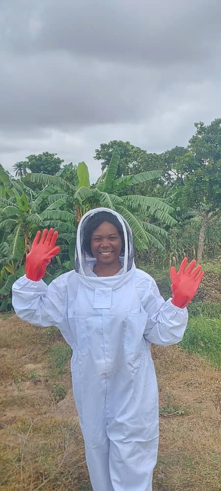 Orji Chiamaka in beekeeping protective clothing